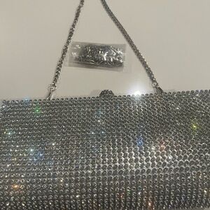 Silver rhinestone evening clutch with two straps. Interchangeable